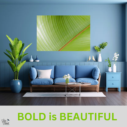 bright green abstract banana leaf wall art hanging in all powder puff blue room contrasting the color decor