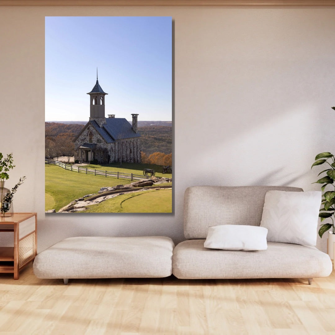 Top of the rock church in fall large wall art hanging in a neutral living space.