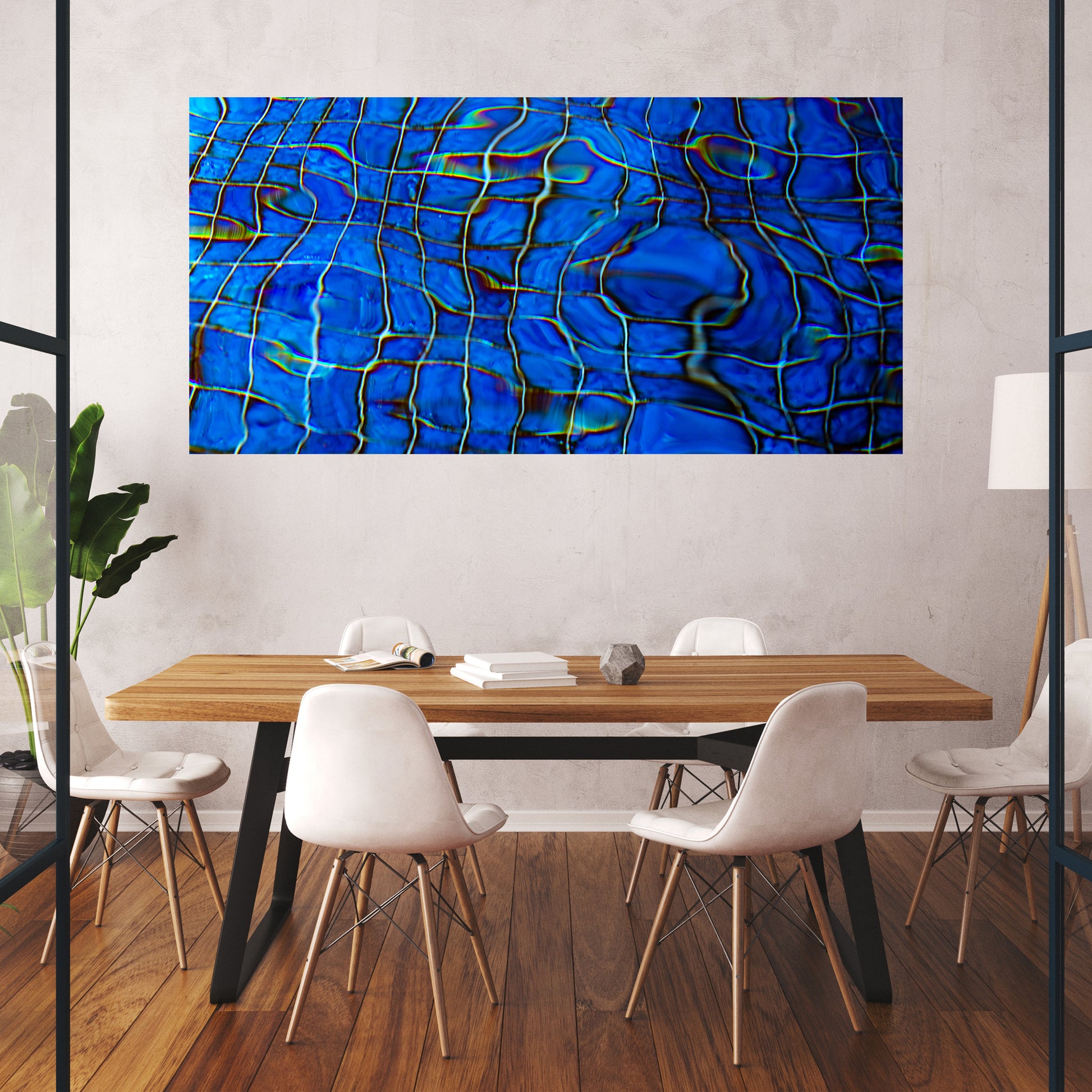 blue abstract disturbed pool lines create pattern in this large wall art decor hanging in a conference room