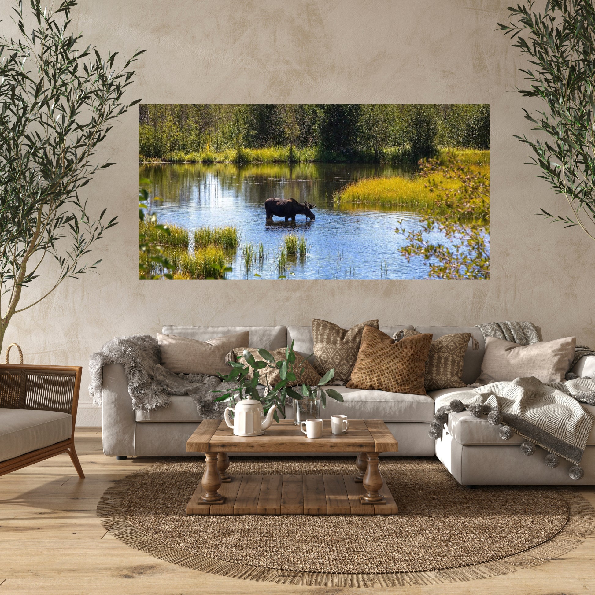fall themed large art of moose drinking water hanging above southwest furniture themes in tan and brown