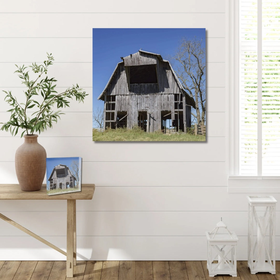 Weathered abandoned barn in Bentonville, Arkansas photographed before its destruction in a 2019 tornado. Available in large art and acrylic block.