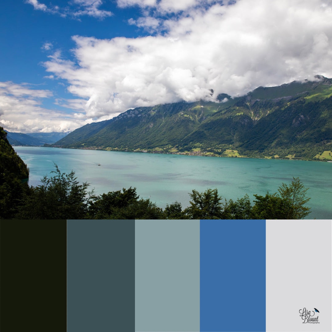 Color Palette for Lake Brienz in Interlaken Switzerland. Blues, teals highlighted with dark mountains and white clouds in the blue sky.