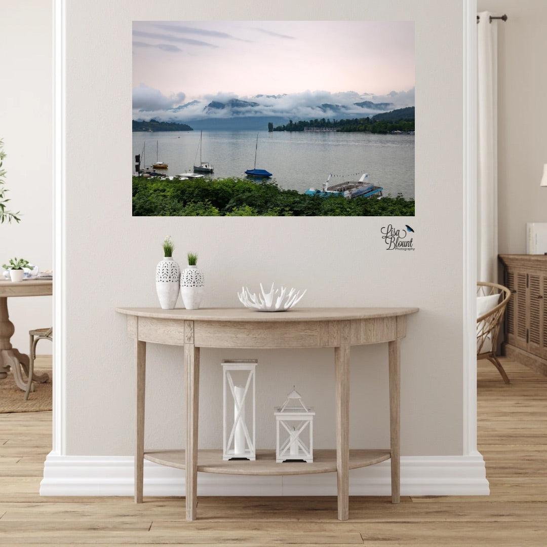 30x20 lake Lucerne wall art on a foggy morning hanging in the hallway above a farmhouse style table