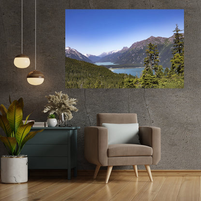 Chilkoot Lake in Haines Alaska art is the center focus of this dark room wall with neutral furniture