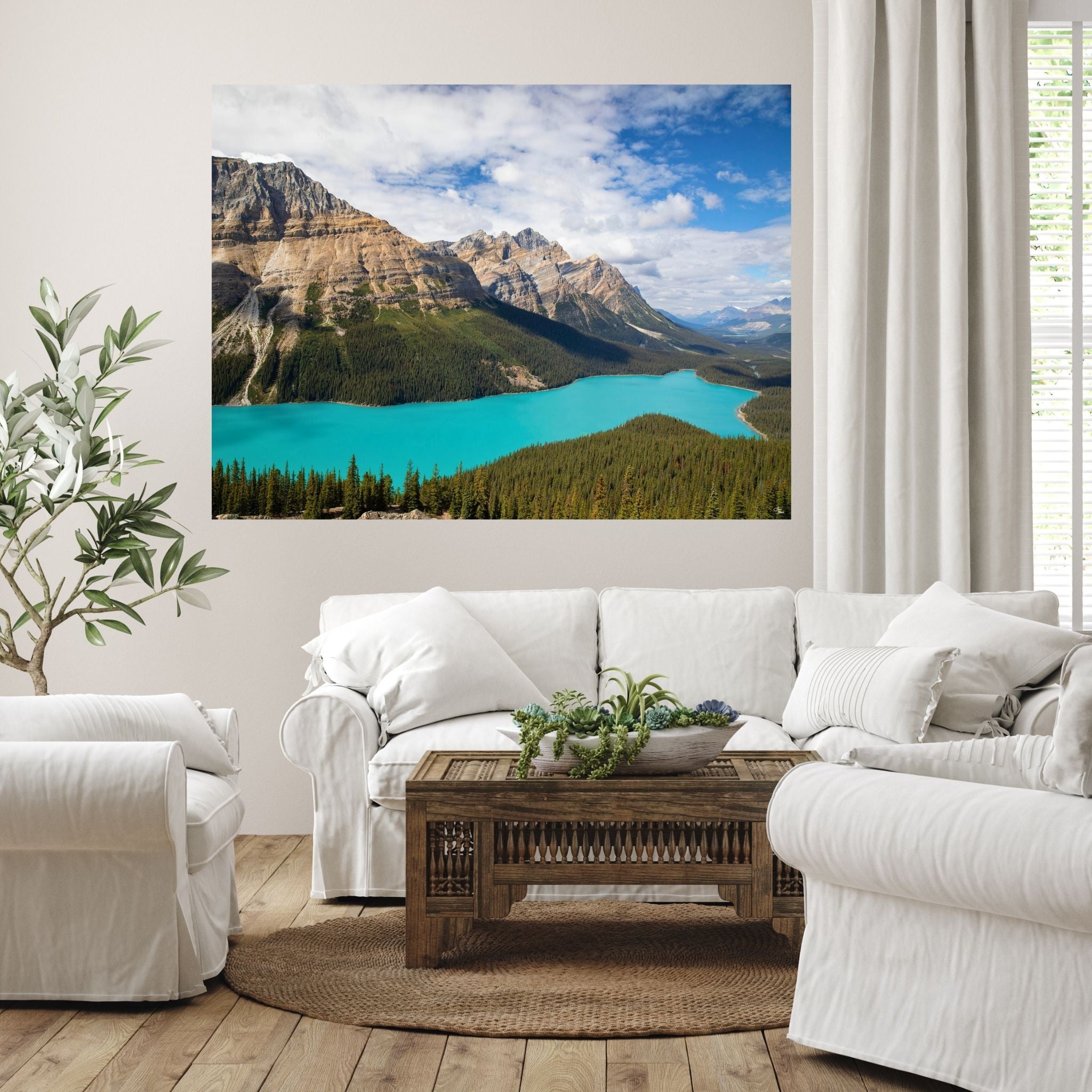Large Peyto Lake acrylic wall art styled above a sofa in a modern mountain-inspired living room