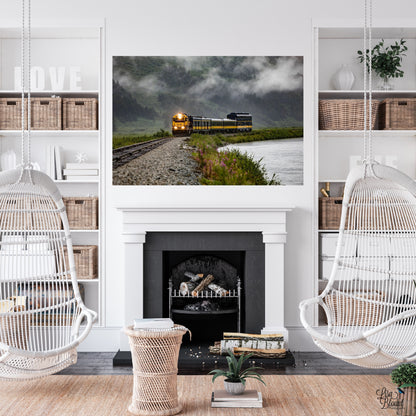 contemporary white room featuring large art of train on tracks in alaska as centerpiece above fireplace