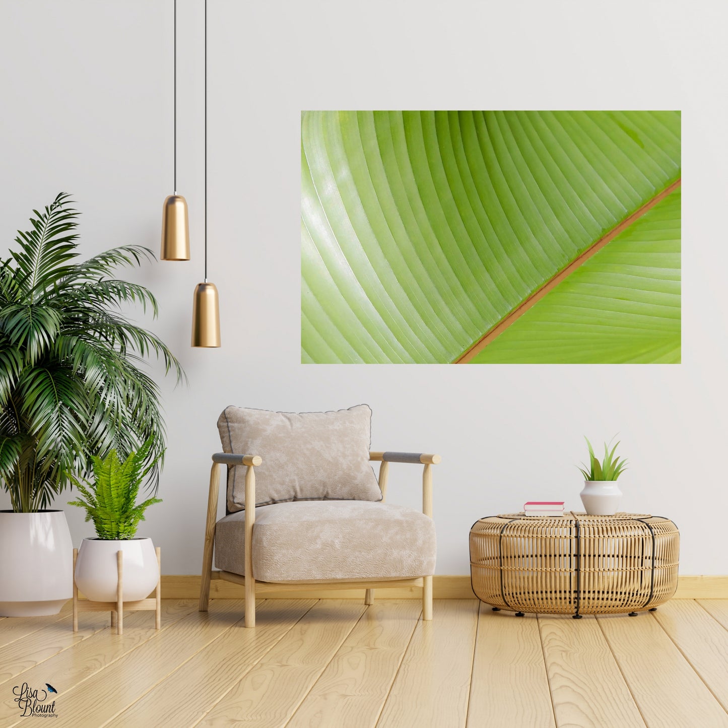 Room setting with greige colors and bright tropical abstract green leaf fine art hanging on wall