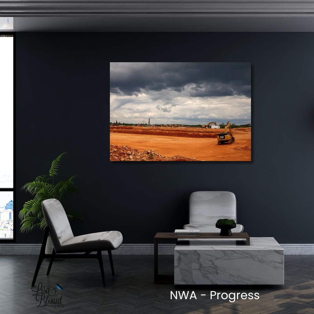 NWA Progress construction wall art displayed in a corporate office lobby, featuring Northwest Arkansas quarry.