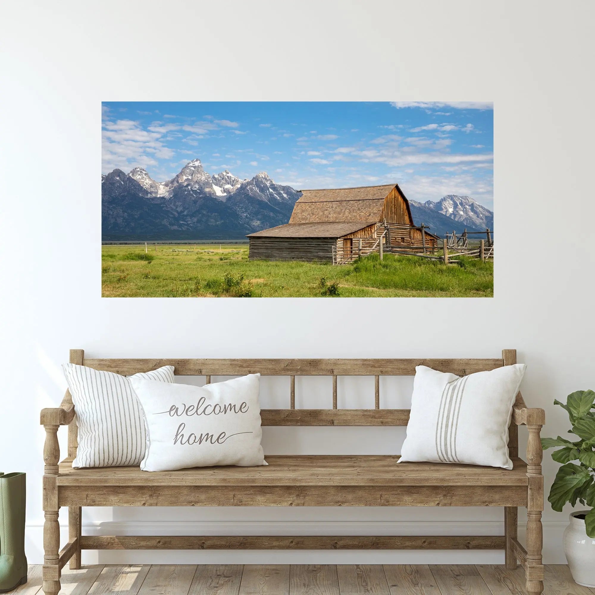 John Moulton Barn wall art displayed above a rustic bench in a neutral farmhouse entryway