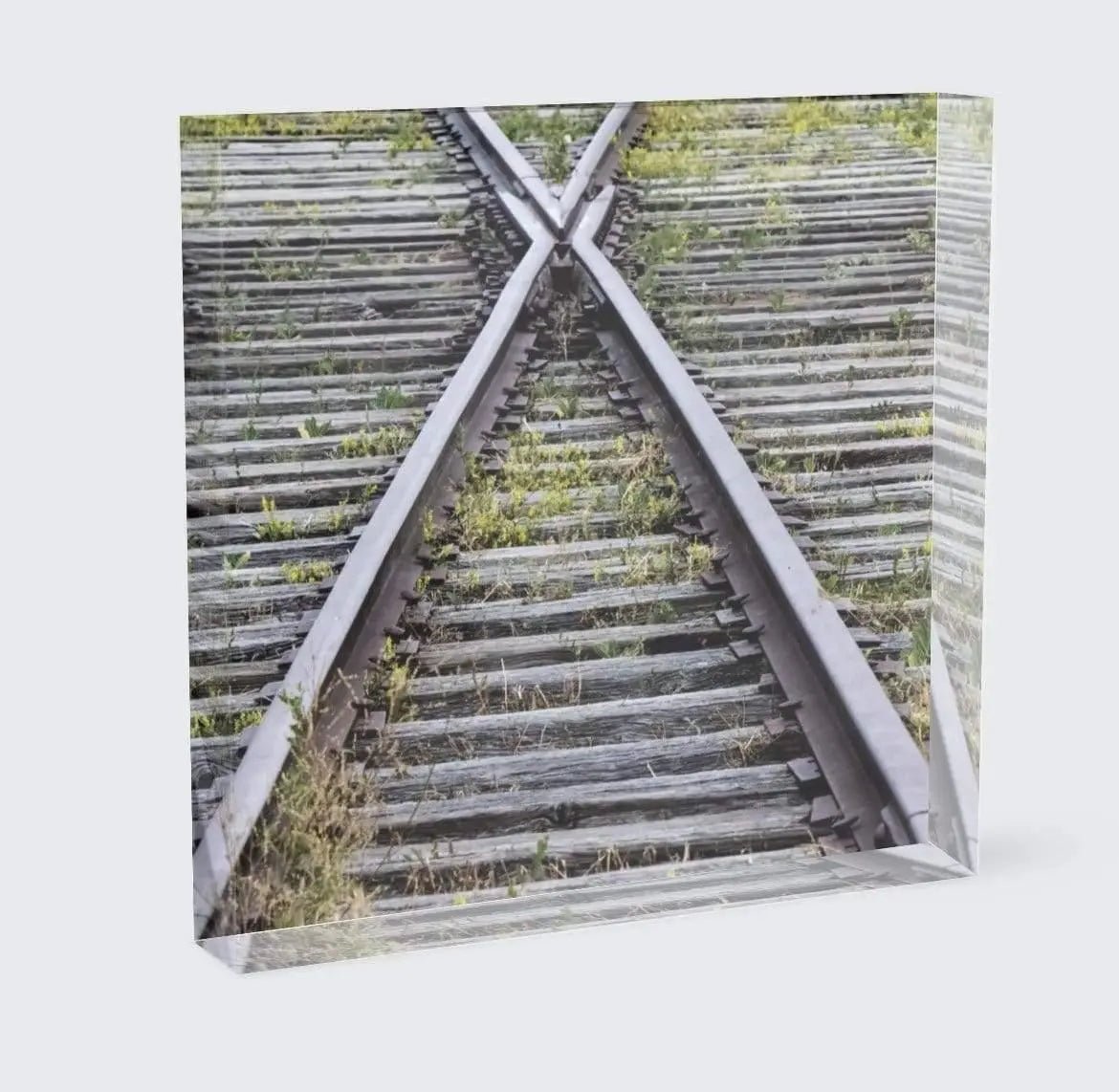 Railroad train track fork in the road on acrylic block