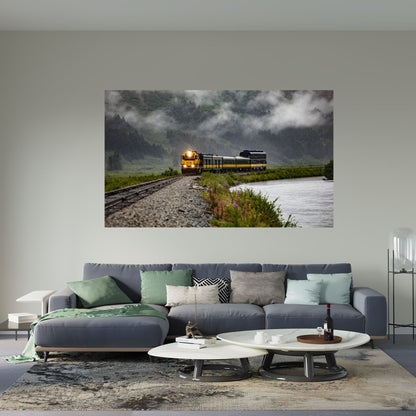 Alaska Train on tracks by cloudy mountain art displayed in living room 