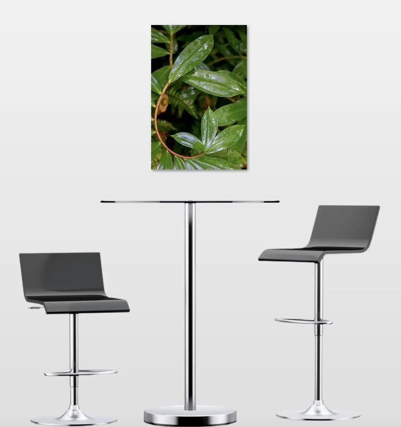 Green leafy abstract Spiral ginger fine art wall decor displayed above bistro table.