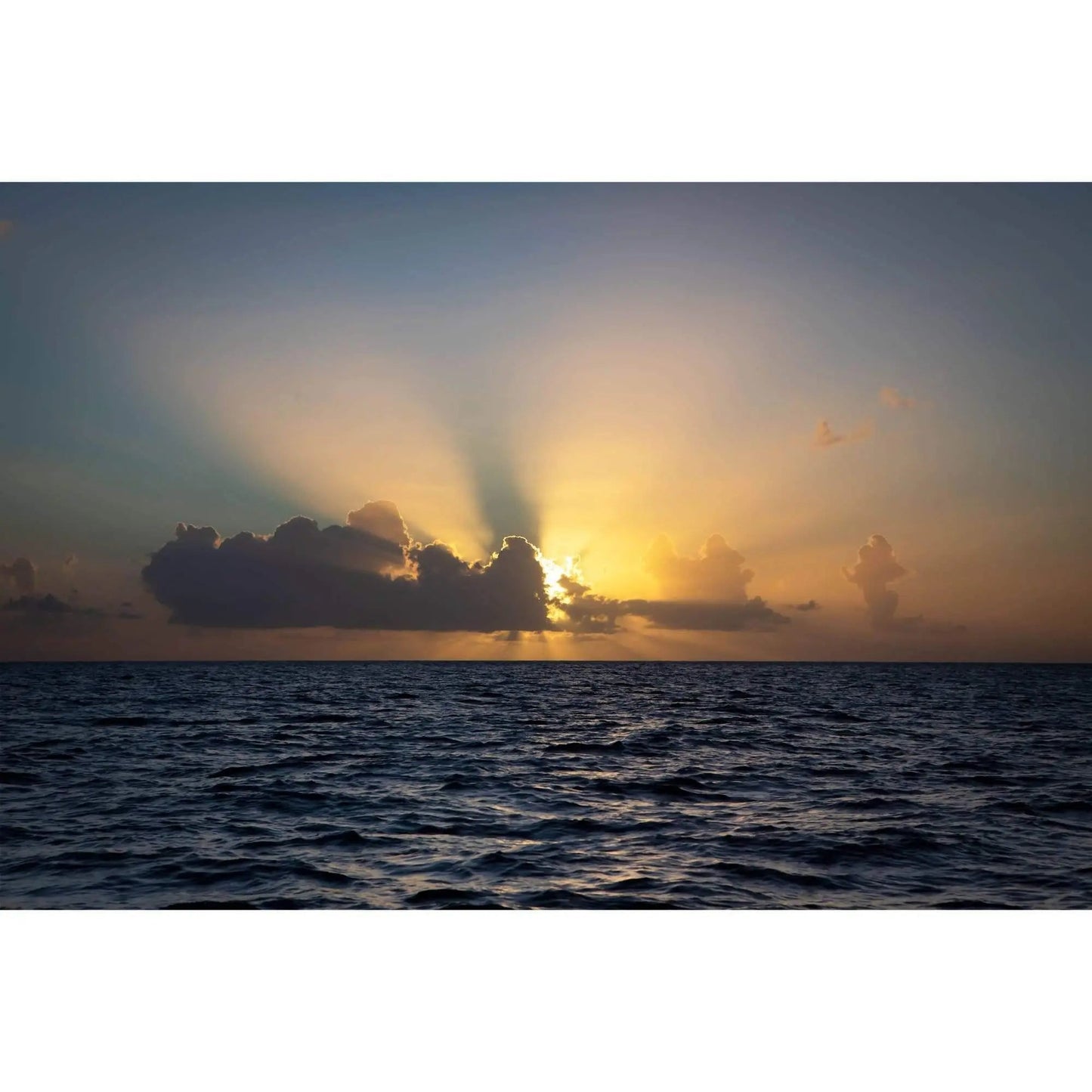 Golden hour sunset cruise sunburst over ocean water metal art