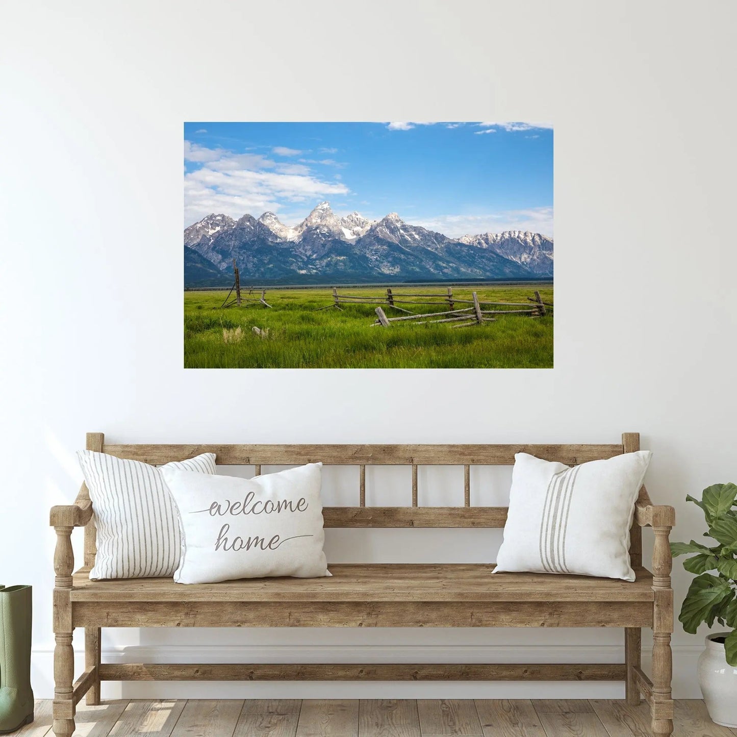 Picture of Grand Tetons with green pasture and wooden fence hanging above a farmhouse style bench