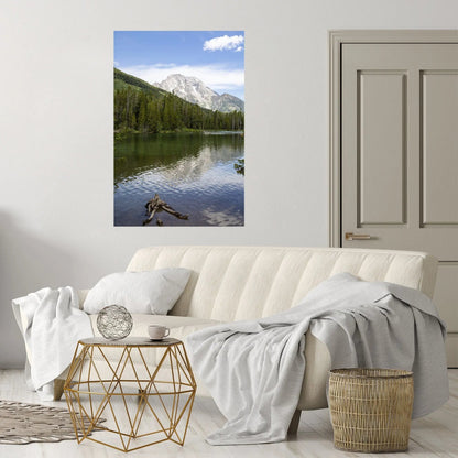 Colorful String Lake art hanging in a white and gray living room