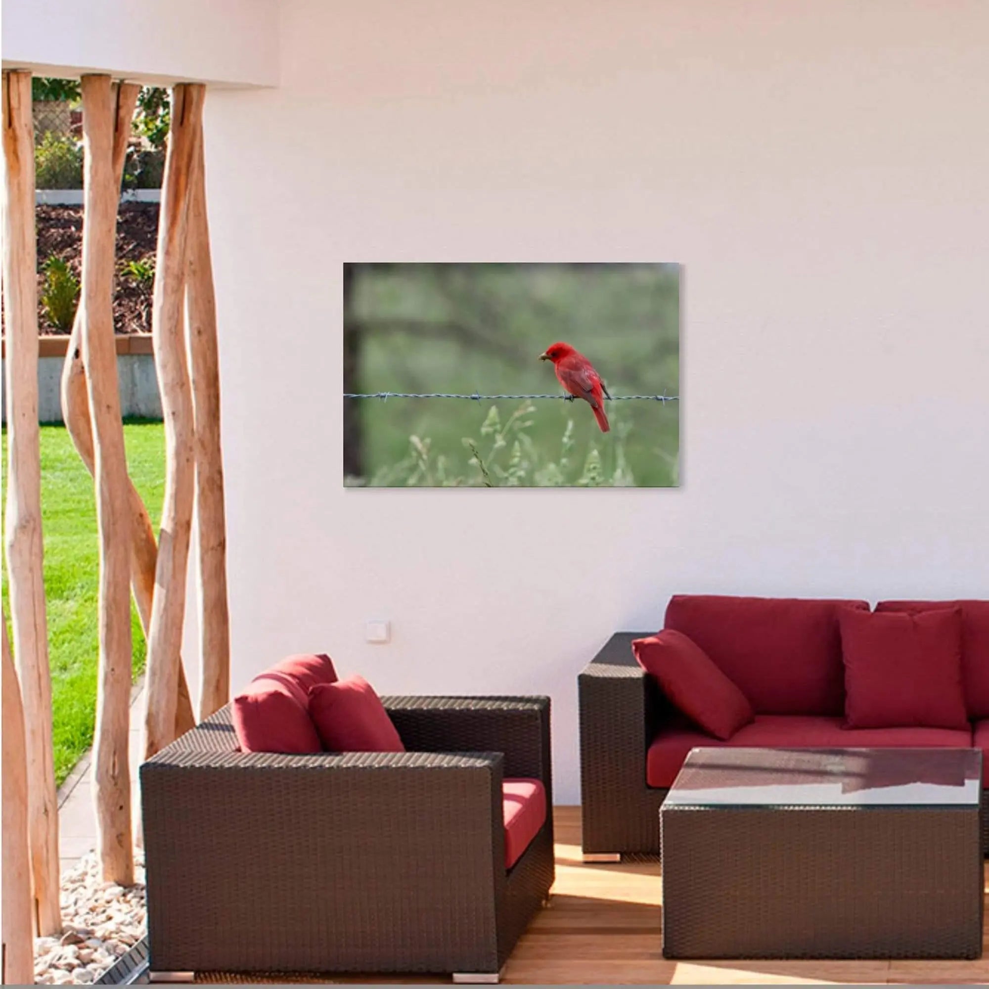 red bird wall art diplayed on wall