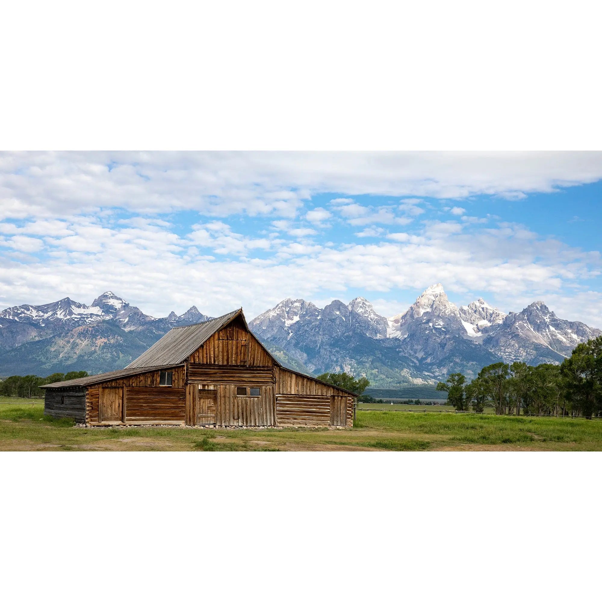 Fine art photograph of the TA Moulton Barn at Mormon Row in Grand Teton National Park with the Teton Range in the background.