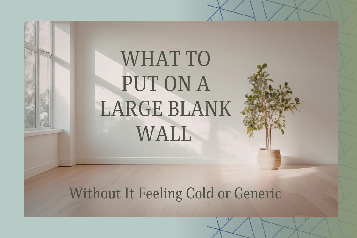 Room with a large blank wall, a plant, and text advice on what to put on a large blank wall without it feeling cold or generic.