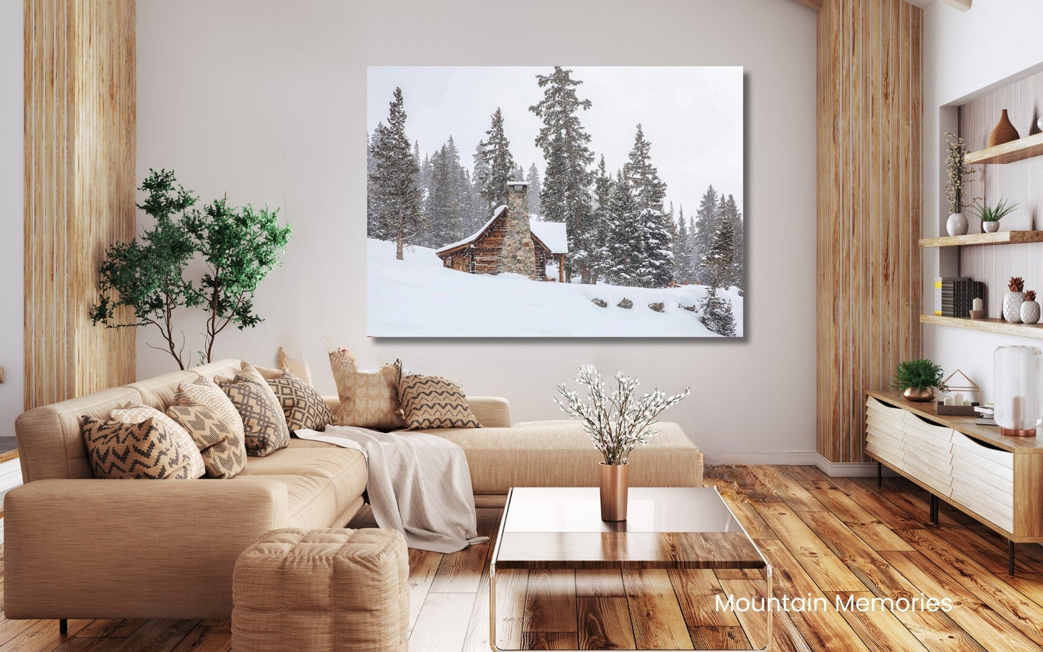 Large canvas print of rustic snow covered cabin in Colorado hanging in a farmhouse themed room.