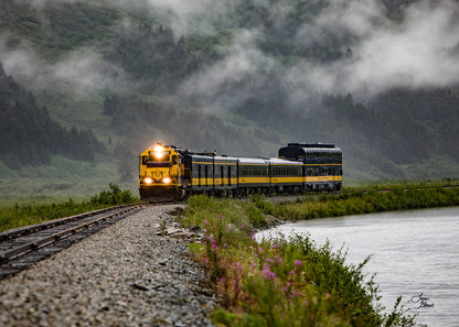 Aboard Alaska fine art greeting cards – set of 25 blank 5x7 cards featuring the Glacier Discovery Train in Alaska, traveling along a track near a body of water with mountains in the background.  Photography by Lisa Blount. 