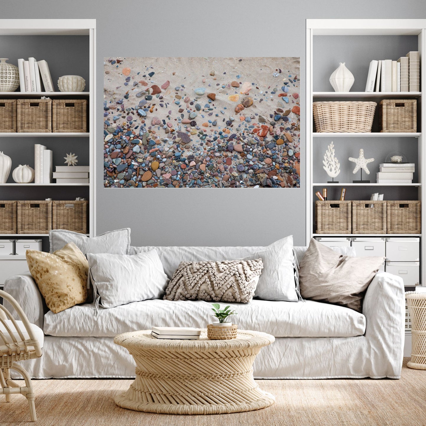Coastal themed room with cream furniture and a large wall art of abstract colorful rocks and sand from Nairn Beach Scotland.
