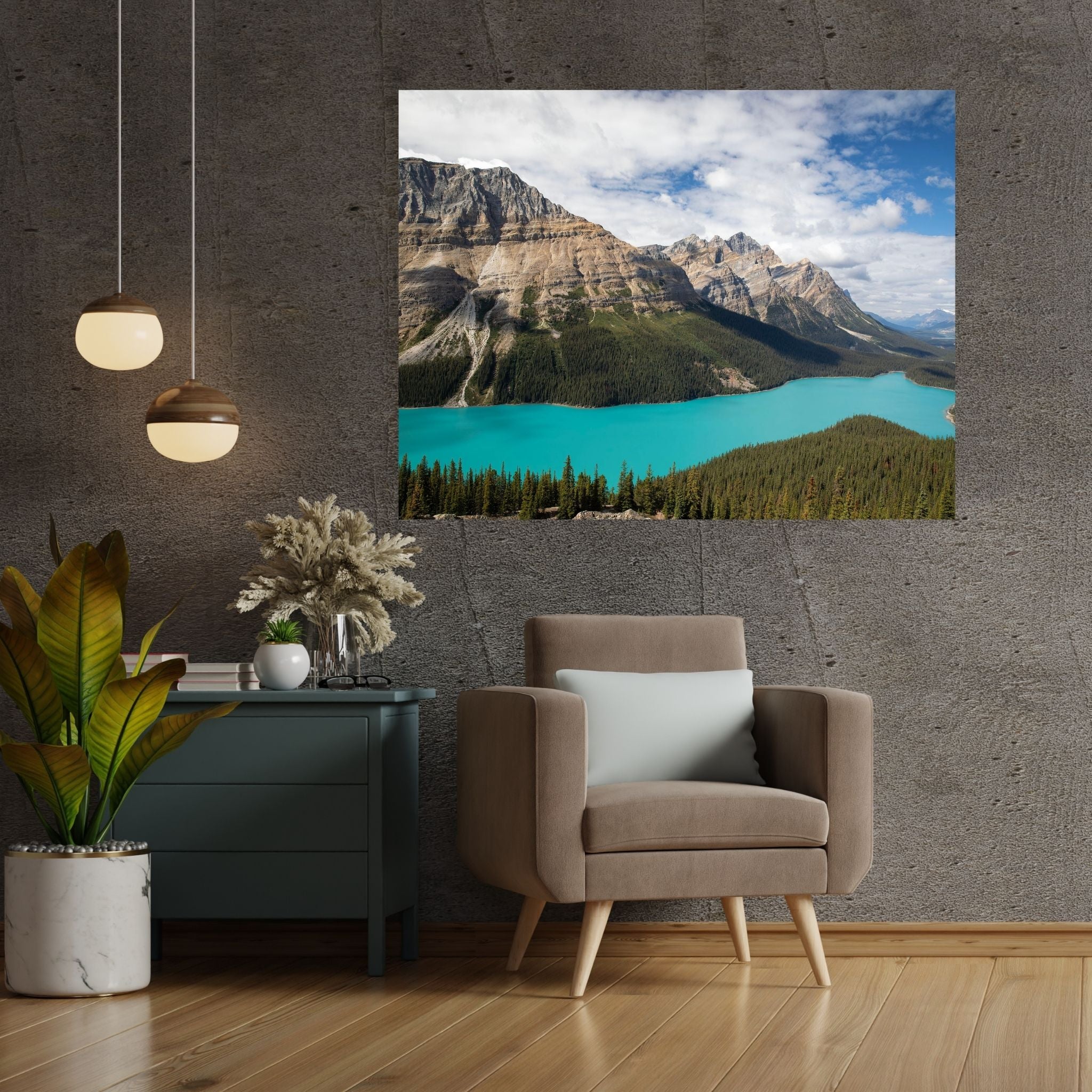 Large Peyto Lake wall art displayed above a white sofa—turquoise Canadian lake with rocky mountain peaks styled in a bright, coastal-inspired living room.