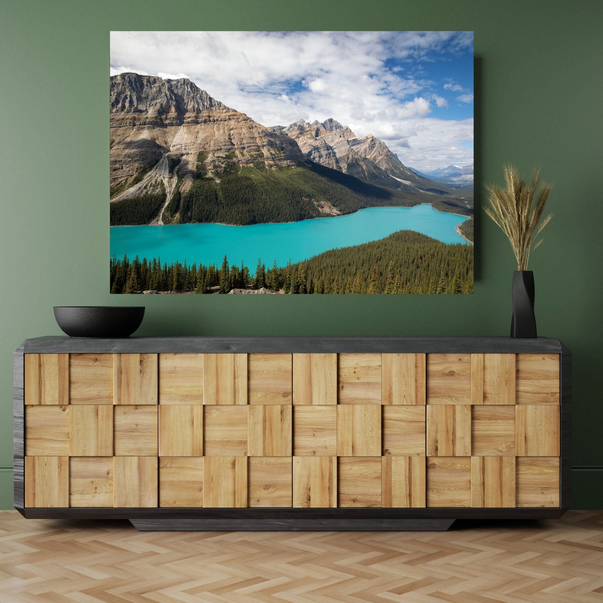 Peyto Lake large acrylic wall print styled on a deep green feature wall above a modern wood credenza—Banff National Park fine art photography.