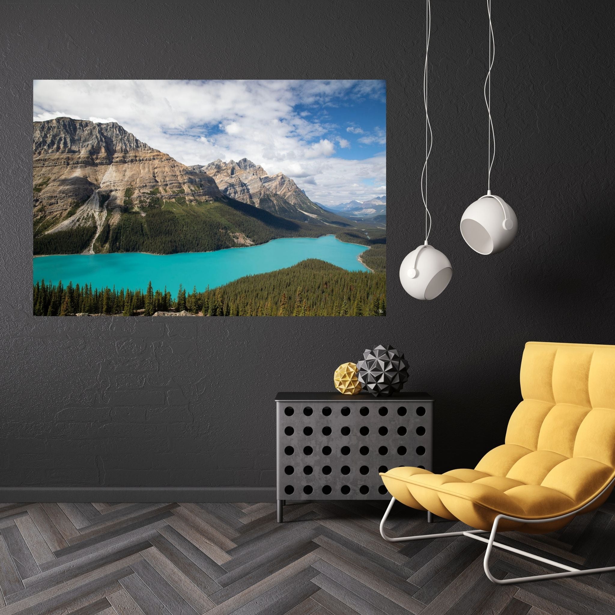 Peyto Lake large acrylic wall print styled on a dark gray feature wall above a modern metal table with hanging lights and a bright yellow chair—Banff National Park fine art photography.