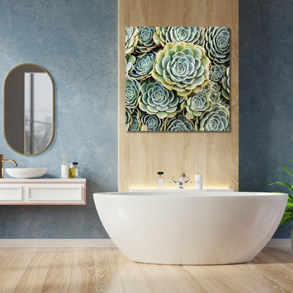 A fine art photograph of green hen and chicks succulents, elegantly displayed as wall decor in a modern bathroom. The vibrant greens and intricate details of the succulent art beautifully complement the serene blue walls, natural wood accents, and the minimalist white bathtub, creating a relaxing and sophisticated space.