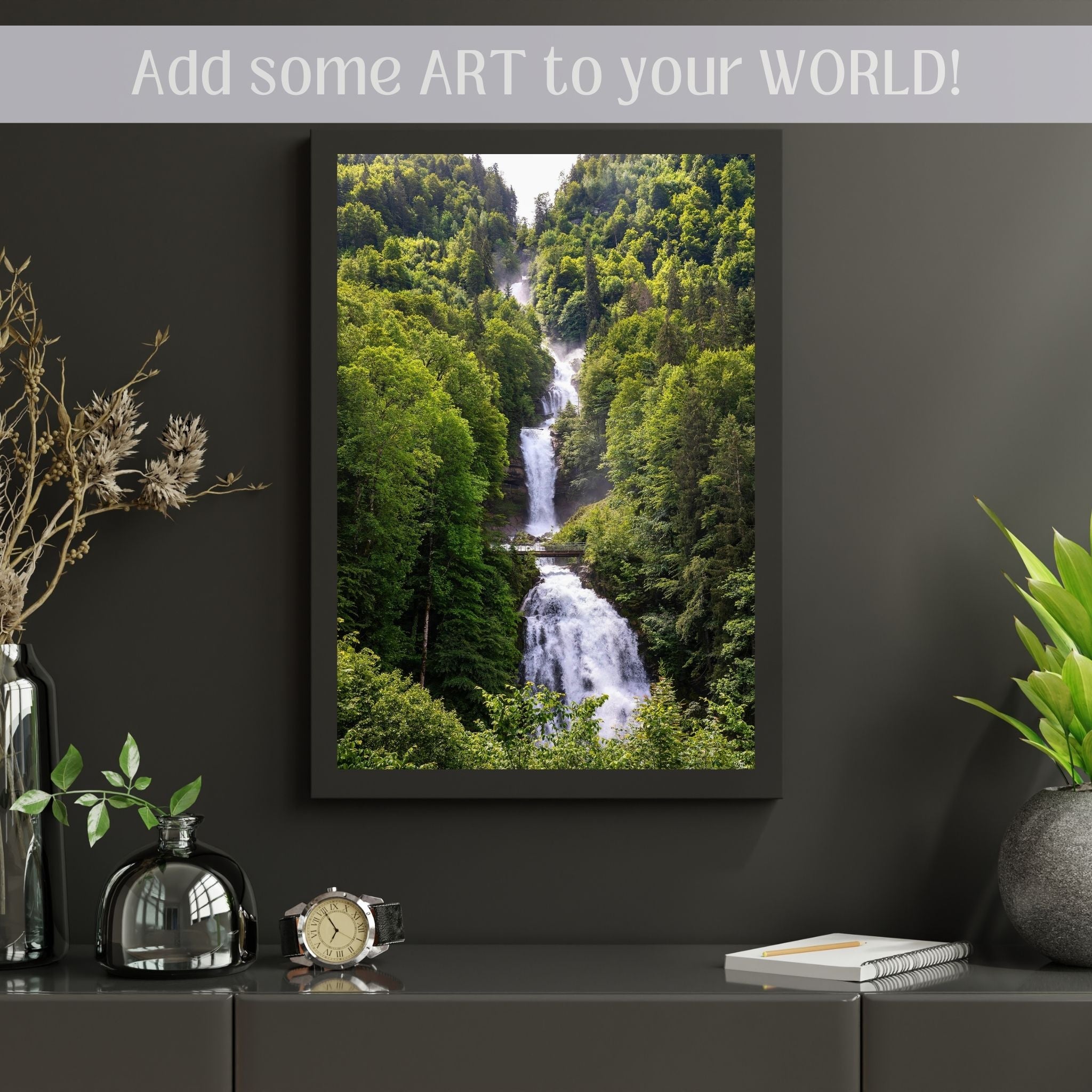 Small sized art of Upper Giessbach Falls on a dark grey wall above a shelf
