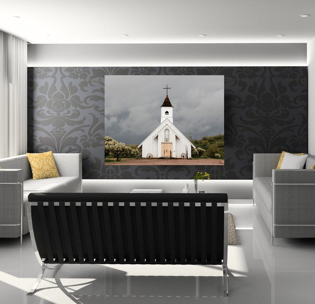 Large “Spiritual Warfare” rustic church wall art displayed in a contemporary living room with gray patterned wallpaper and modern seating.